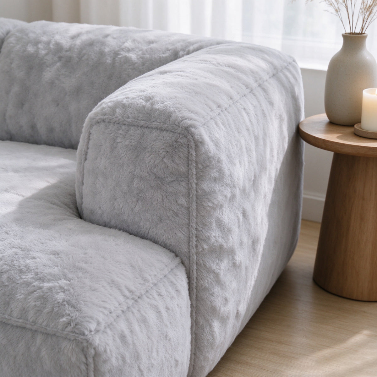 Close-up of the plush arm and cushion on the Russet sofa